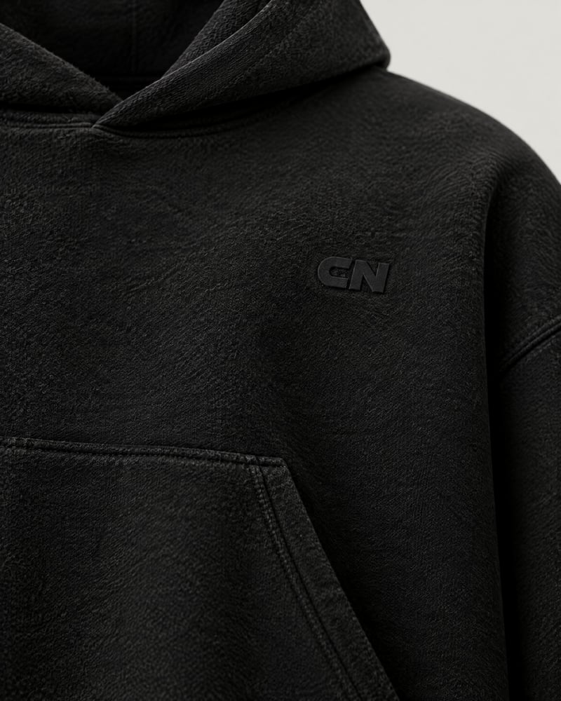 Sudadera con capucha oversize lisa, detalle del estampado